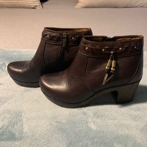 Brown platform boots.